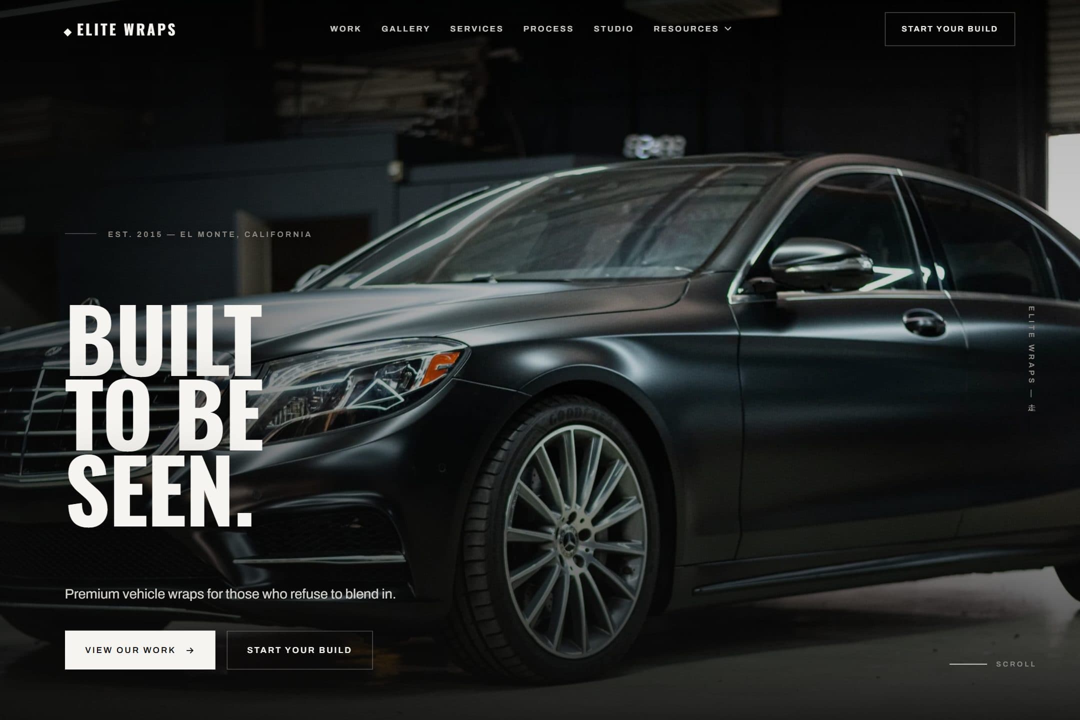 Elite Wraps homepage: a dark Mercedes saloon in a workshop under the headline Built To Be Seen